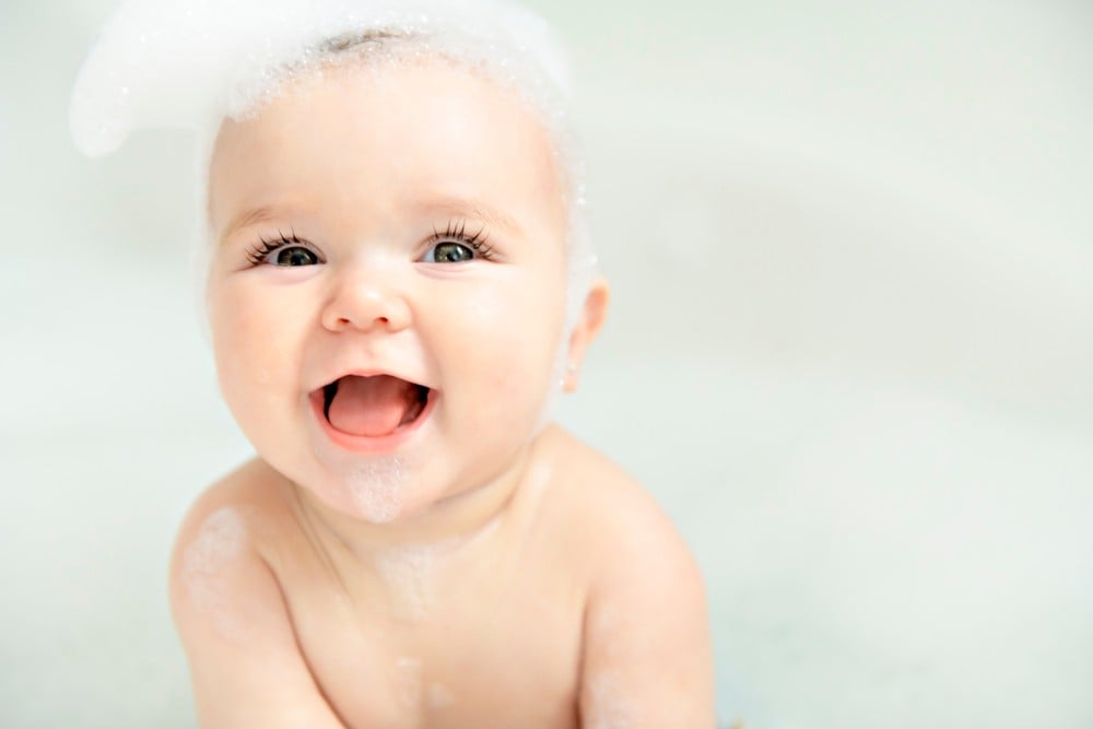 baby girl bathes bath foam soap