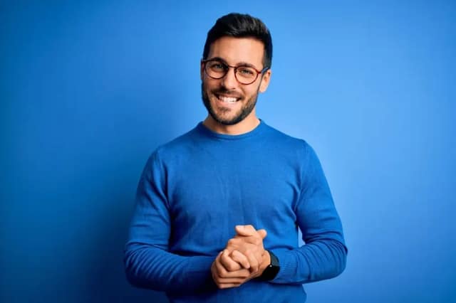 Smiling man representing a known sperm donor