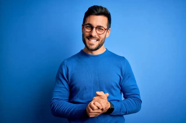 Smiling man representing a known sperm donor