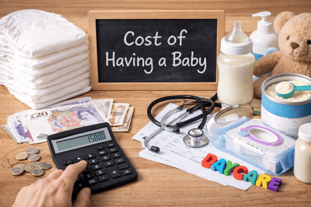 Cost of having a baby concept with calculator, money, diapers and baby essentials