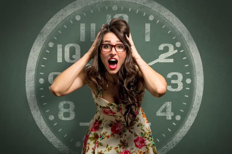 woman feeling anxious about her biological clock ticking and fertility declining