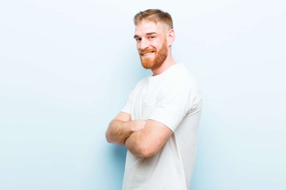 Young,Red,Head,Man,Smiling,To,Camera,With,Crossed,Arms